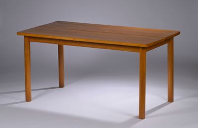 a wooden table with a wooden top on a gray background