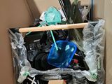 a box full of trash that is sitting on the floor