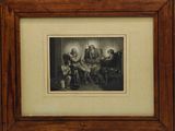 a framed picture of a group of people sitting around a table