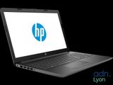 a laptop computer with a hp logo on the screen