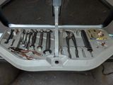 many tools in the open case on the table
