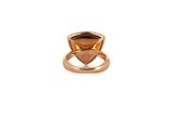 a close up of a ring on a white background