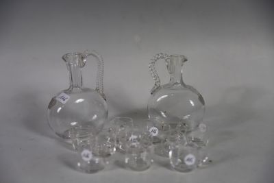 a lot of glass items that are sitting on a table