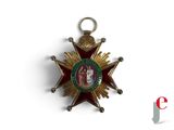 an image of a medal with a picture of a woman on it