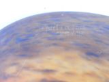 a close up view of a vase with a sky background