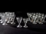 a lot of empty wine glasses on the table