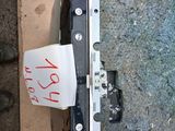 a picture of a piece of metal with a sign on it