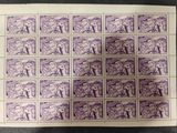 a sheet of purple stamps with images of people on them