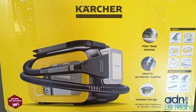 the box of a karcher vacuum is open on the table