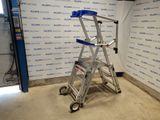 a ladder that is sitting in a room