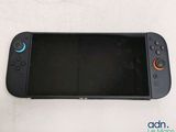 a close up of a black nintendo wii game controller