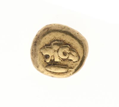 une pièce d'or sur laquelle est représenté un lion