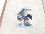 a picture of a book with a picture of a mountain on it
