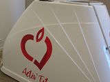 a white counter with a red apple logo on it