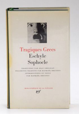 an old book with a picture of a woman ' s face on it