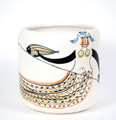 a white vase with a painting of a woman on it