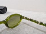 a pair of glasses that are laying on a table