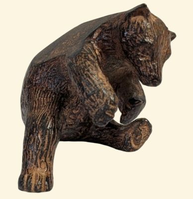 Pierre CHENET (XXe/XXIe) "Ourson grizzly brun couché jouant"
