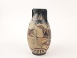 a vase with a picture of a man and a woman on it