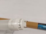 a baseball bat that has a blue handle on it