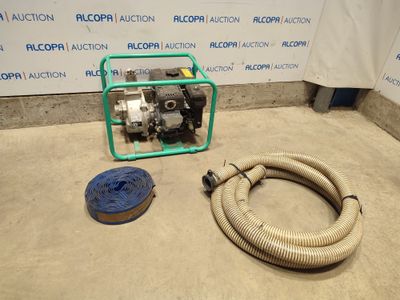 an image of a hose and a pump sitting on the floor
