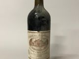 a bottle of wine that is sitting on a table