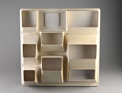 a picture of a white display case with many compartments