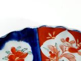 a plate with a red and blue design on it