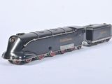 a toy train that is sitting on a white surface