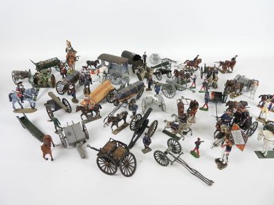 de nombreuses figurines posées sur une surface blanche