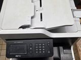 a printer that is sitting on top of a table