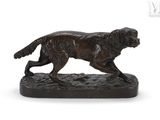 bronze statue of a dog running on a base on a white background