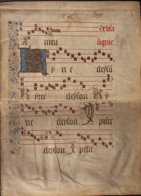 un gros plan sur un livre dont une page est recouverte de notes de musique