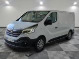 the white van is parked on a checkered floor in a room
