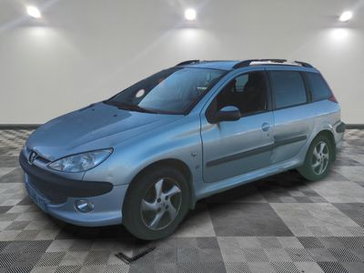 a picture of a blue car parked in a garage