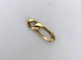 a close up of a gold ring on a white surface