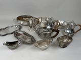 silver plated tea and coffee set on a white background