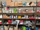 many boxes and boxes on the shelves in the room