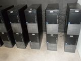 a lot of computer equipment that are sitting on the floor