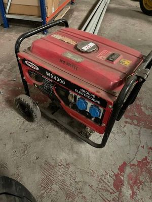an image of a small generator in a garage