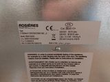 a close up of a label on a stainless steel refrigerator