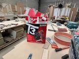 a picture of a workbench in a workshop with tools on the table