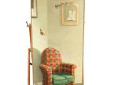 a picture of a chair in front of a mirror