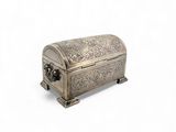 an old silver box with a handle on a white background