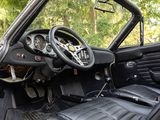 an image of the interior of a car with the door open