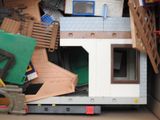 a box full of toys that are in a room