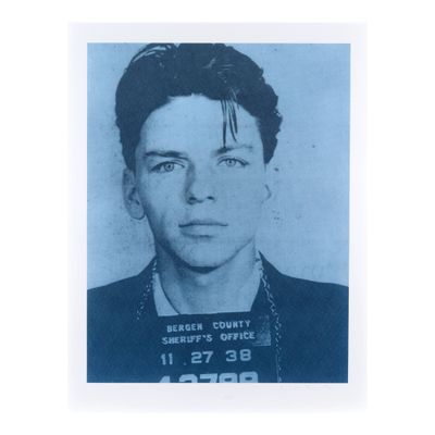 a black and white photo of a man in a mug shot