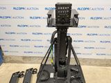 an image of a camera on a tripod in front of a wall