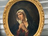 a picture of a painting of a woman holding a rosary