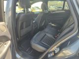 a car that has two seats in the back of it